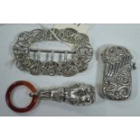 Rattle, vesta case and buckle