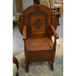 20th century oak monks chair