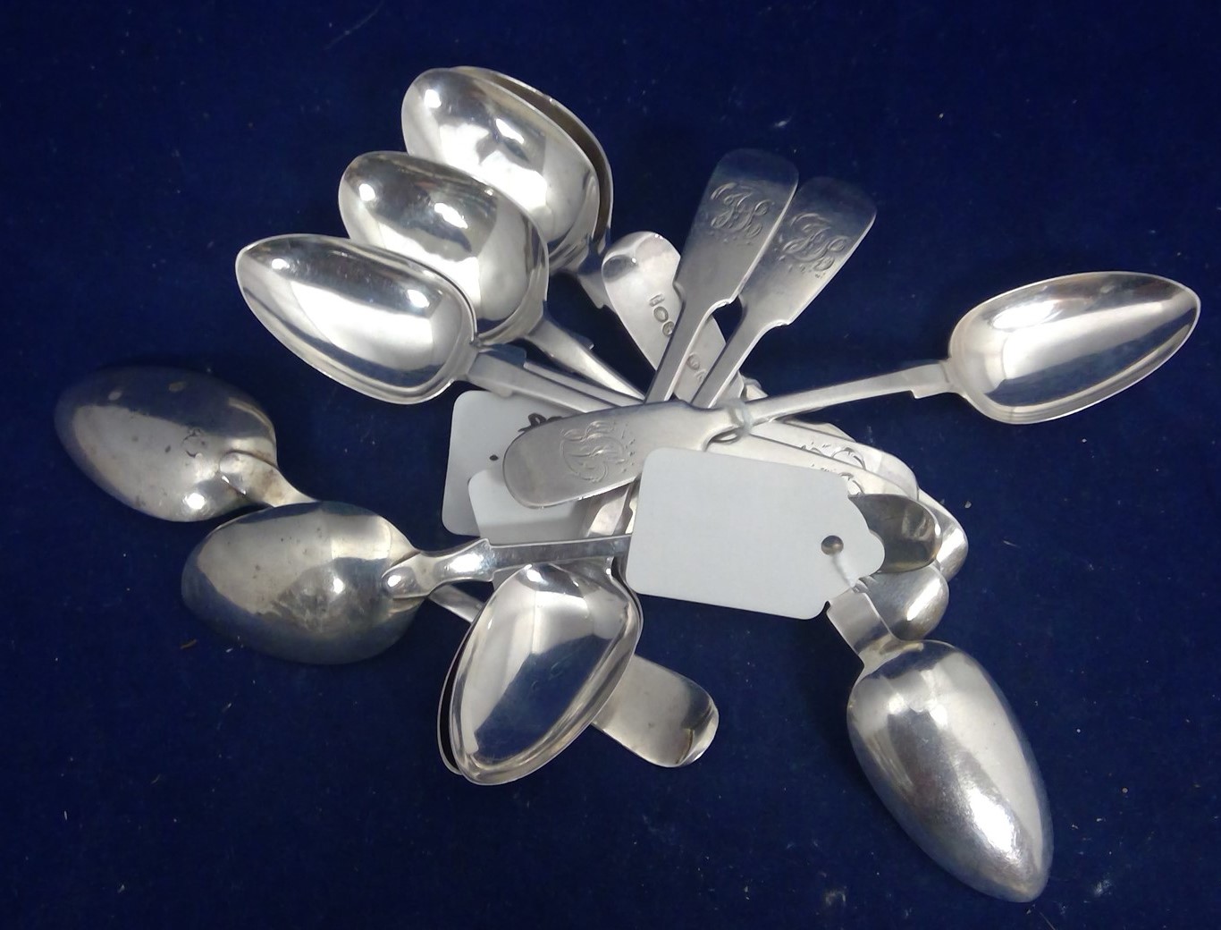 Two sets of silver teaspoons