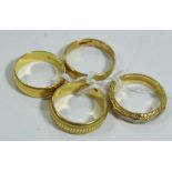 Four gold rings