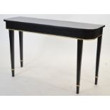 A 19th century ebonised side table