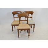 A set of three mahogany dining chairs