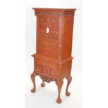 A 20th Century mahogany chest on stand