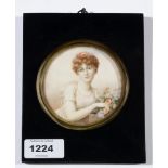 20th Century British School - a miniature bust portrait of a young woman with flowers,