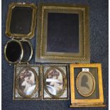 Five photograph frames.