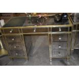 Mirrored glass dressing table; and matching top.