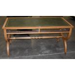 A modern maple Regency style writing table, rectangular outline, with tooled green leather inset