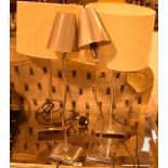 Two pairs of table lamps and shades.