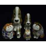 Three Studio pottery cats; and three ceramic figures.
