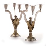 A pair of silver limited edition candelabra