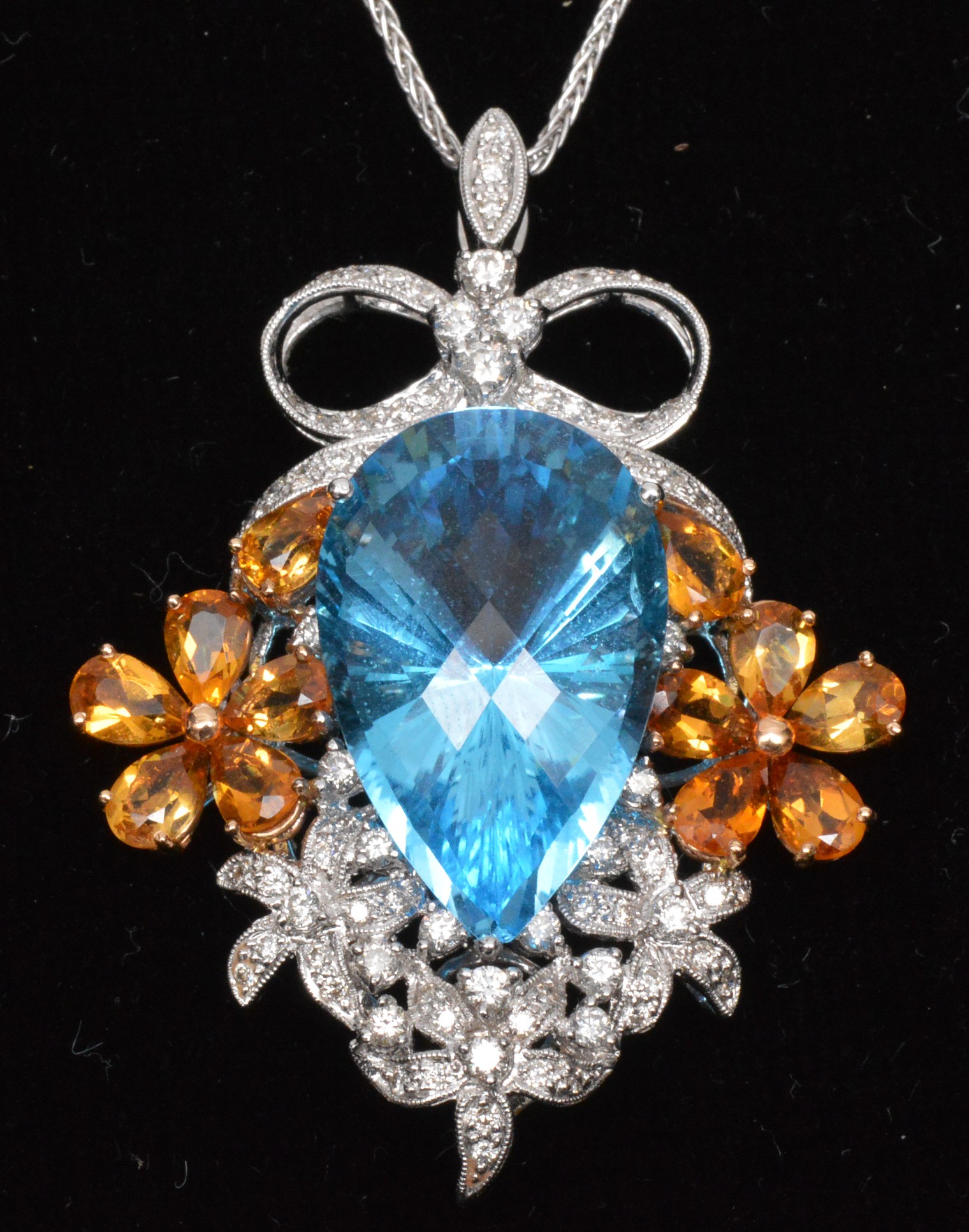 Topaz and diamond pendant