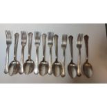 Set of six German silver forks and spoons.