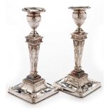 Pair of silver candlesticks