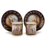 A pair of Sevres style coffee cans and saucers