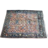 Qum rug, with floral design on red ground, 200 x 176cms.