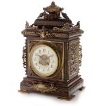 S Marti: an ornate late 19th Century mahogany and gilt bronze bracket clock.