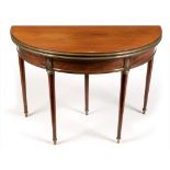 A Directoire mahogany and brass mounted games table