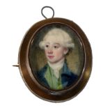 18th Century British School - a miniature bust portrait of a young man