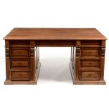 An impressive late Victorian mahogany partners desk , the moulded rectangular top above a single