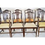 Eight George III style mahogany dining chairs