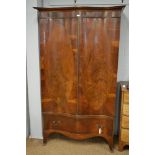 Early 20th Century serpentine wardrobe