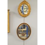 Pair of oval wall mirrors