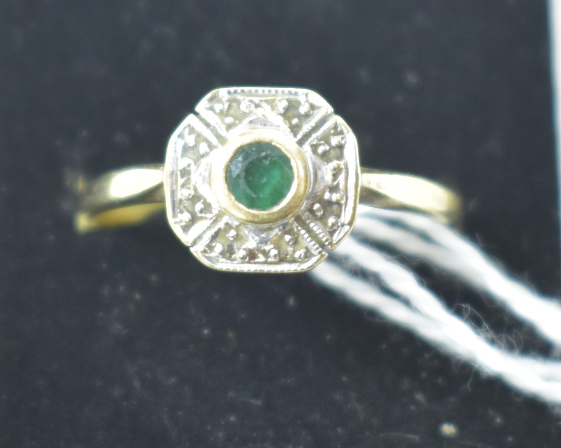 Emerald and diamond ring