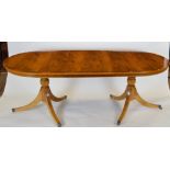 Modern yew pedestal dining table