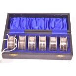 Six silver napkin rings