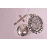 Silver locket, crucifix and pill pot