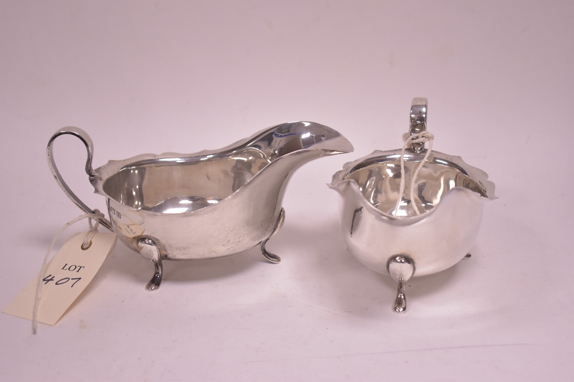 A pair of silver sauce boats