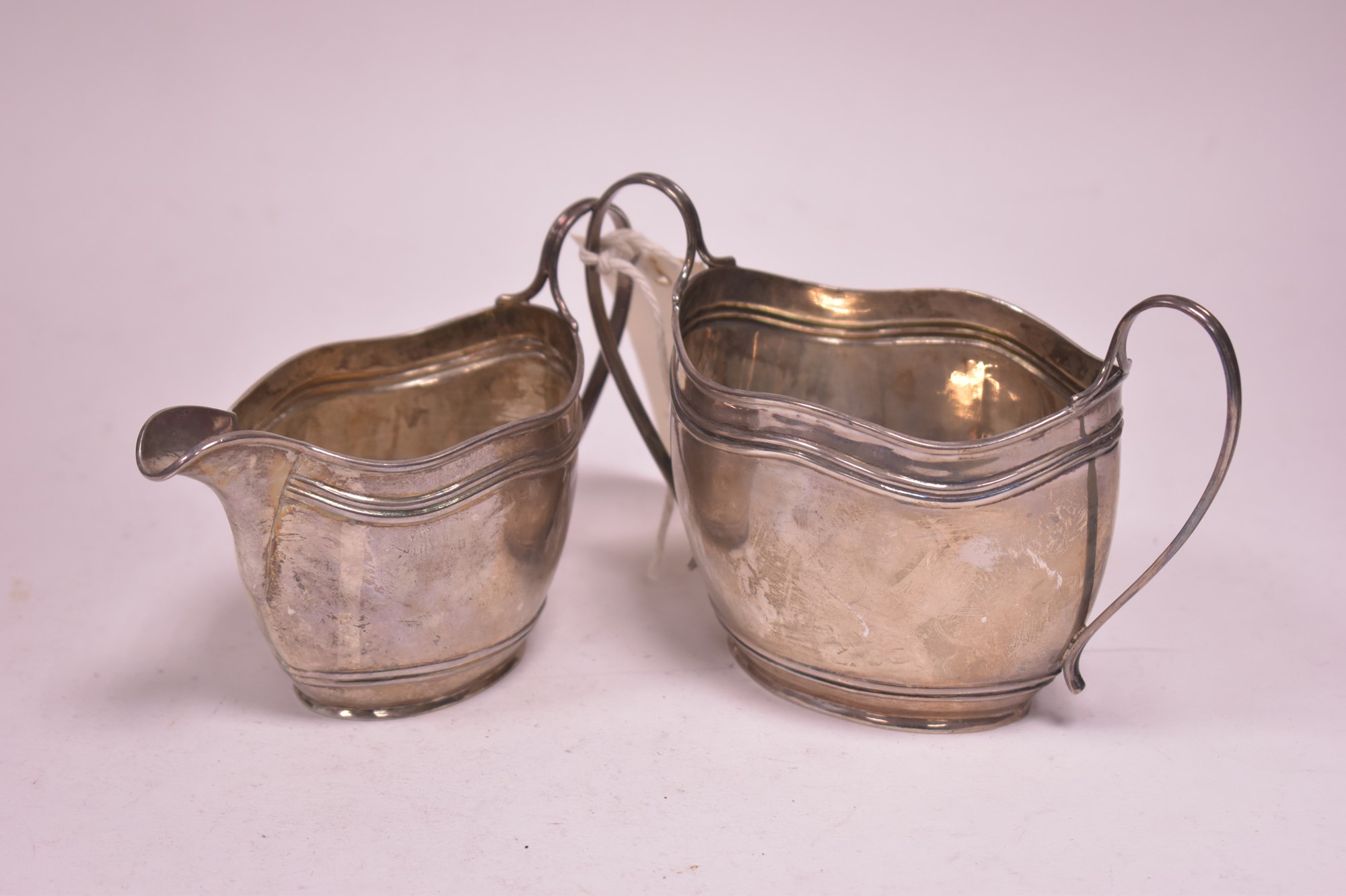 Silver jug and sugar bowl