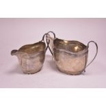 Silver jug and sugar bowl