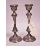 A pair of silver candlesticks