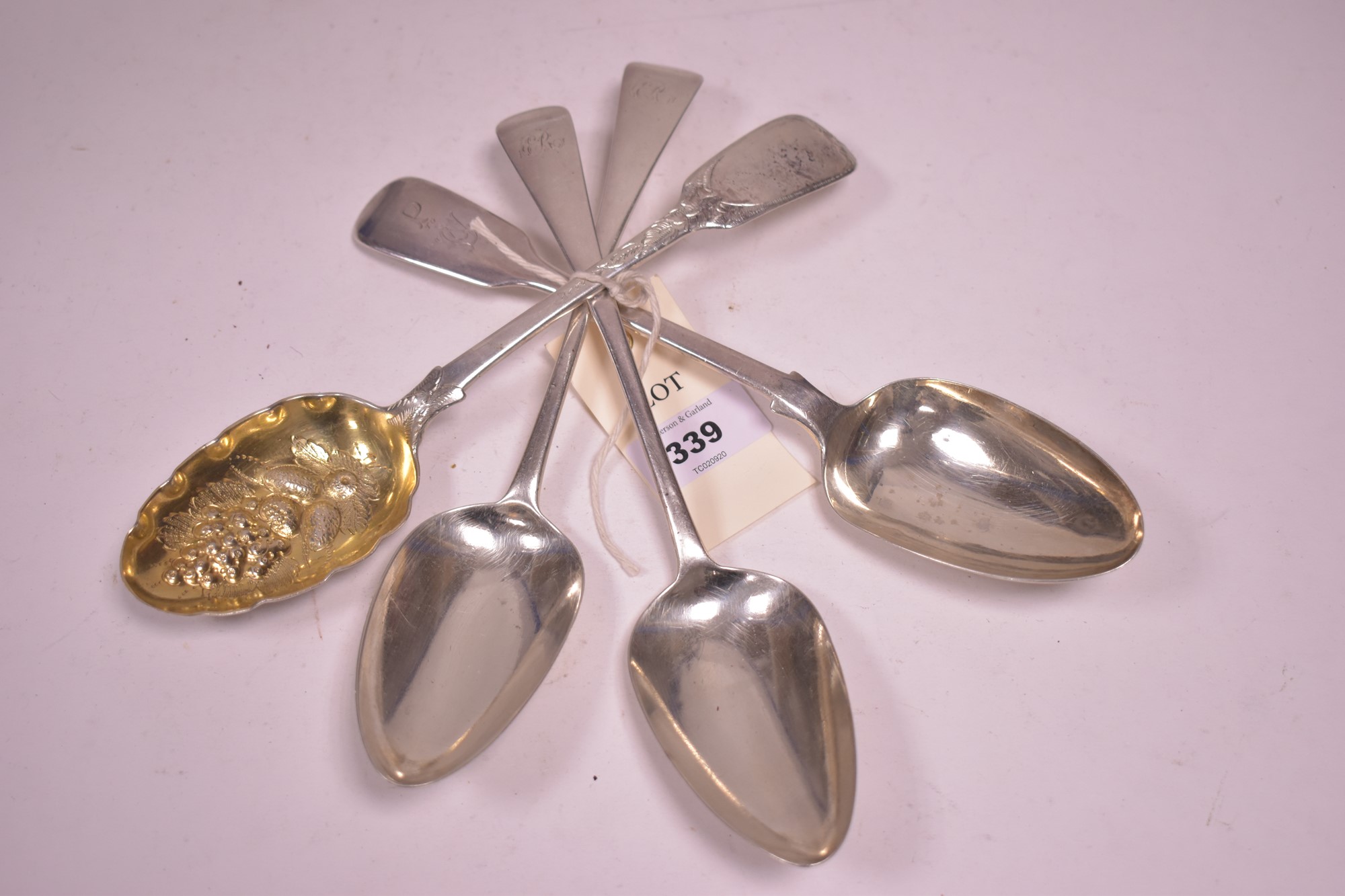 Four silver tablespoons