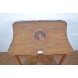 An ornate Edwardian painted mahogany occasional table