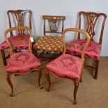 Two Georgian style dining chairs; a Georgian dining chair; and two balloon back chairs