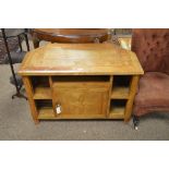 A 20th Century satinwood and parquetry inlaid TV cabinet, the shaped top above an arrangement of