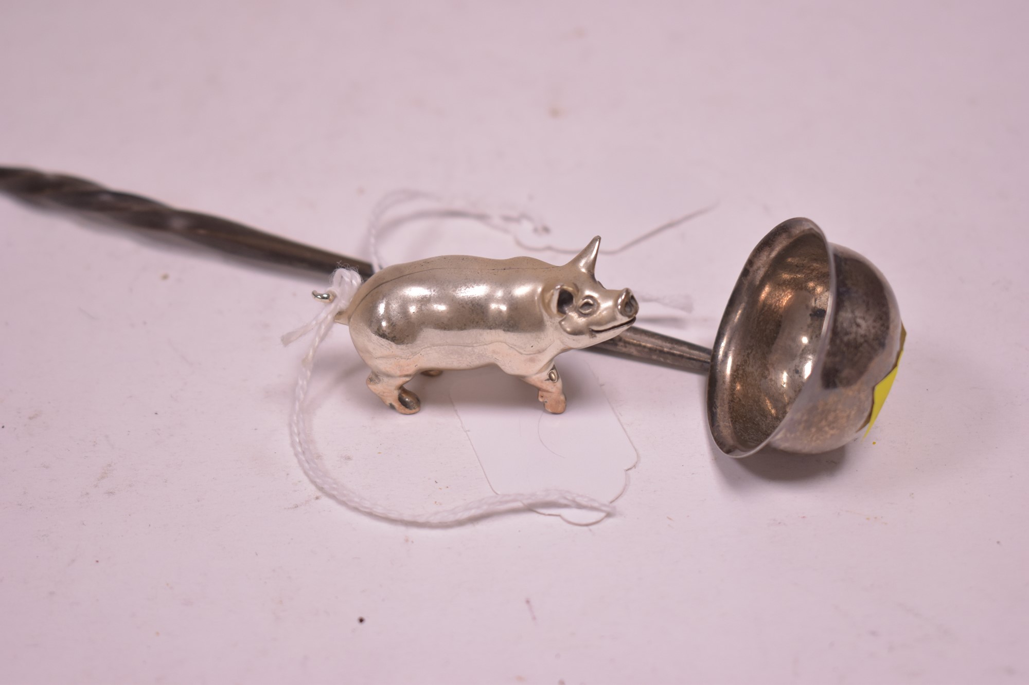 Silver pig and toddy ladle