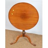 A 19th Century mahogany tripod table.