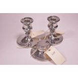 Pair silver candlesticks and inkwell.