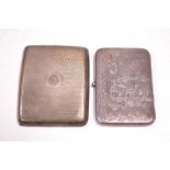 A silver note case and cigarette case