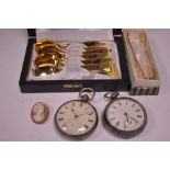 Two pocket watches, a cameo brooch and other items