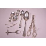 Silver sugar tongs and other items