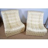 Four 1960's button upholstered designer lounge chairs.
