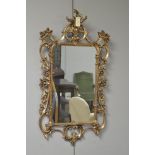 A Chippendale style mirror.