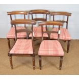 A harlequin set of five mahogany dining chairs in the Regency style.