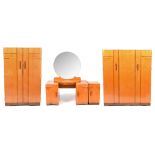 An Art Deco maple veneered four-piece bedroom suite