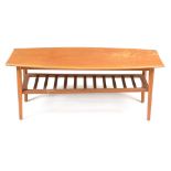 A mid 20th Century teak and beech coffee table.