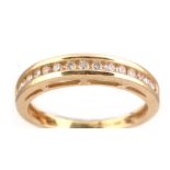 A diamond half hoop eternity ring